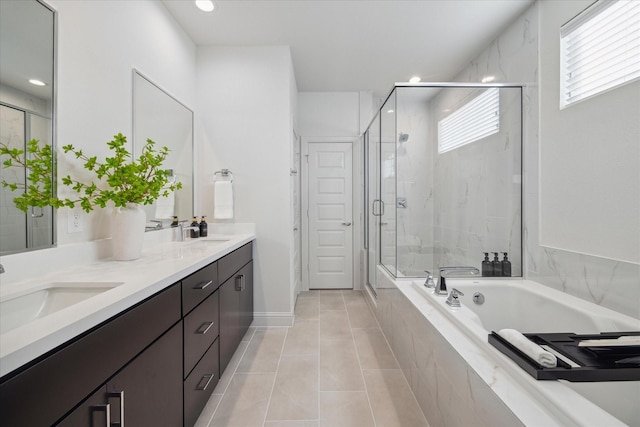 full bathroom featuring a garden tub, a stall shower, tile patterned floors, double vanity, and recessed lighting