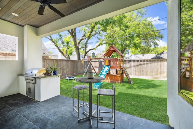 3912 Browning St, West University Place, TX 77005 - view of patio featuring an outdoor kitchen, a playground, a ceiling fan, and grilling area
