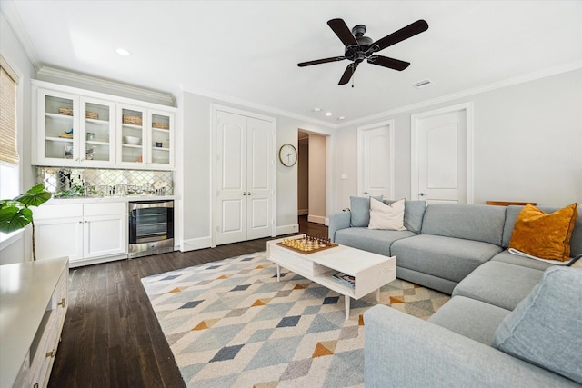3912 Browning St, West University Place, TX 77005 - living room with beverage cooler, wood finished floors, recessed lighting, crown molding, and ceiling fan