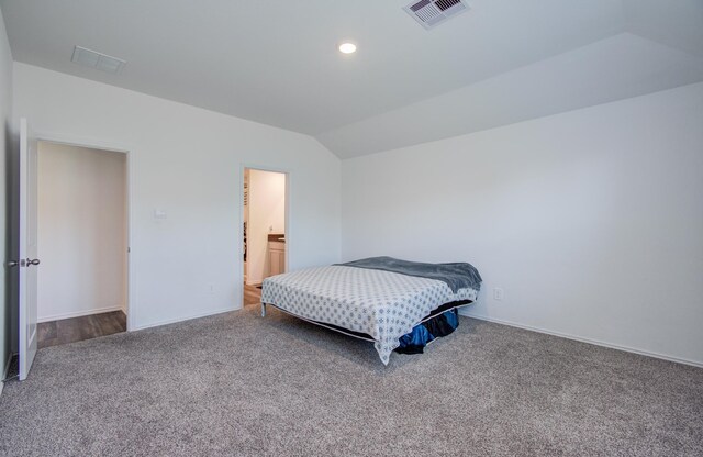 carpeted bedroom featuring vaulted ceiling, baseboards, and recessed lighting