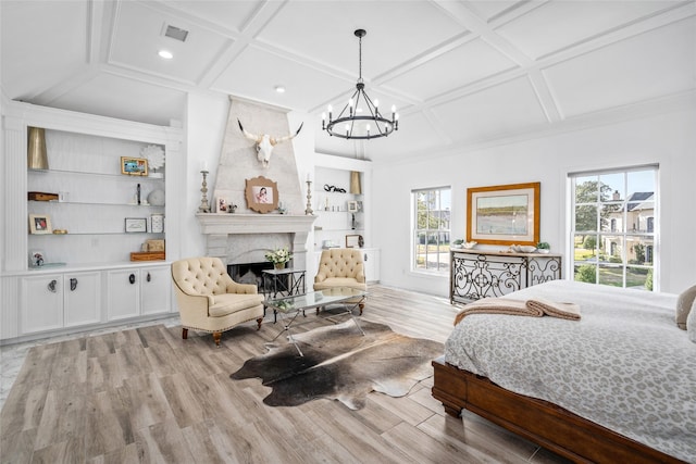 853 Rocky River Rd, Houston, TX 77056 - bedroom featuring coffered ceiling, light wood-style floors, a chandelier, a premium fireplace, and recessed lighting