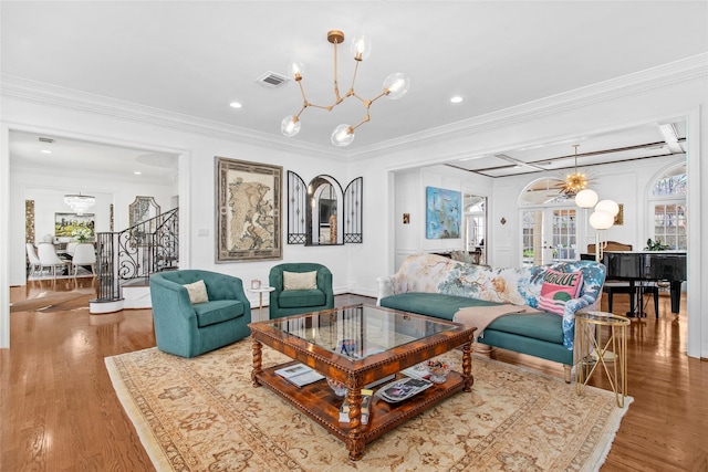 853 Rocky River Rd, Houston, TX 77056 - living room with a chandelier, stairs, ornamental molding, healthy amount of natural light, and recessed lighting