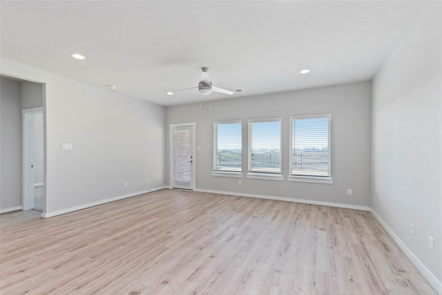 7434 Rivercane Shore Ln, Richmond, TX 77407 - unfurnished room with ceiling fan, light wood-style flooring, recessed lighting, and baseboards
