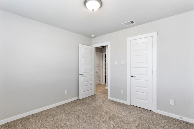 7434 Rivercane Shore Ln, Richmond, TX 77407 - unfurnished bedroom with light colored carpet and baseboards