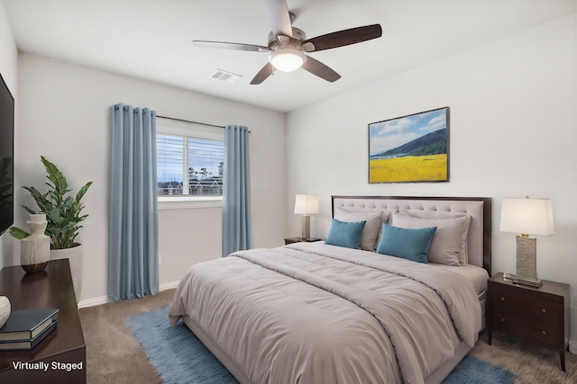 15863 Sundew Prairie Dr, Humble, TX 77346 - carpeted bedroom with baseboards and ceiling fan