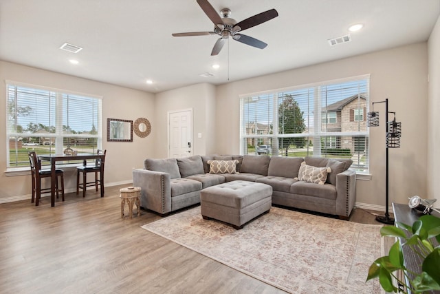 15863 Sundew Prairie Dr, Humble, TX 77346 - living room featuring baseboards, wood finished floors, a ceiling fan, and recessed lighting