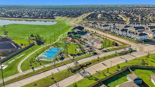 15863 Sundew Prairie Dr, Humble, TX 77346 - aerial overview of property's location with a nearby body of water, nearby suburban area, and a golf club