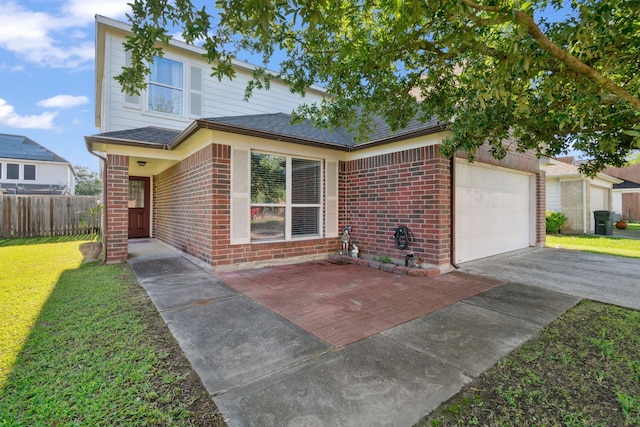 8006 Saffron Ln, Baytown, TX 77521 - traditional-style home featuring driveway, brick siding, and an attached garage
