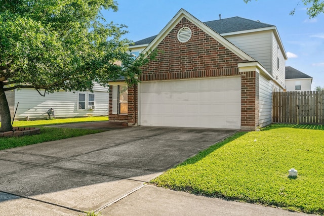 8006 Saffron Ln, Baytown, TX 77521 - traditional-style house with brick siding, concrete driveway, a garage, and roof with shingles
