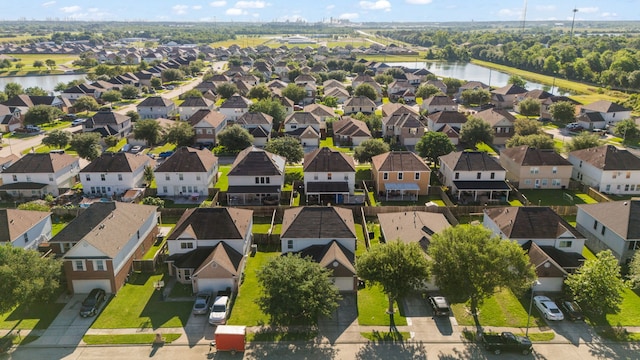 8006 Saffron Ln, Baytown, TX 77521 - aerial view of residential area with a large body of water