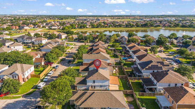 8006 Saffron Ln, Baytown, TX 77521 - aerial perspective of suburban area with a nearby body of water