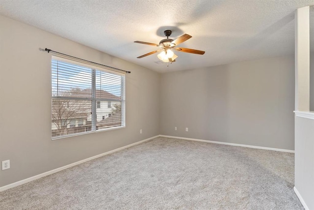 15422 Elm Leaf Pl, Cypress, TX 77429 - carpeted empty room featuring ceiling fan, a textured ceiling, and baseboards