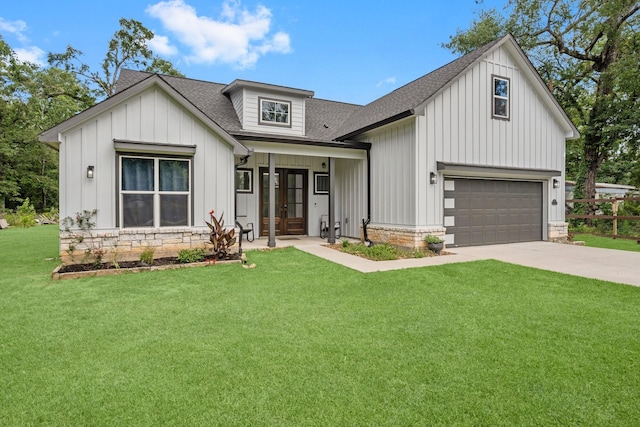 16709 W Rayburn Dr, Conroe, TX 77302 - modern inspired farmhouse with french doors, roof with shingles, board and batten siding, concrete driveway, and a garage