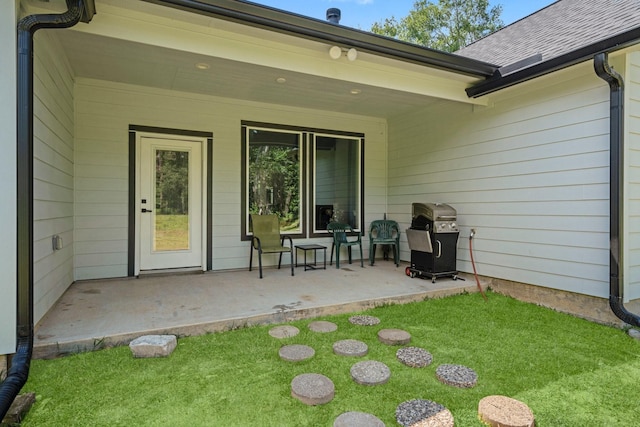 16709 W Rayburn Dr, Conroe, TX 77302 - back of house featuring a lawn and a patio area