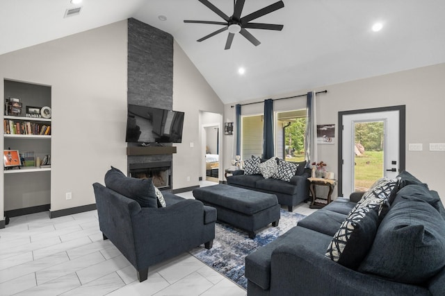16709 W Rayburn Dr, Conroe, TX 77302 - living room with ceiling fan, high vaulted ceiling, a fireplace, recessed lighting, and light marble finish floors
