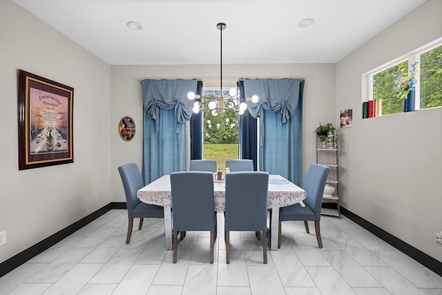 16709 W Rayburn Dr, Conroe, TX 77302 - dining space featuring a chandelier, healthy amount of natural light, and baseboards
