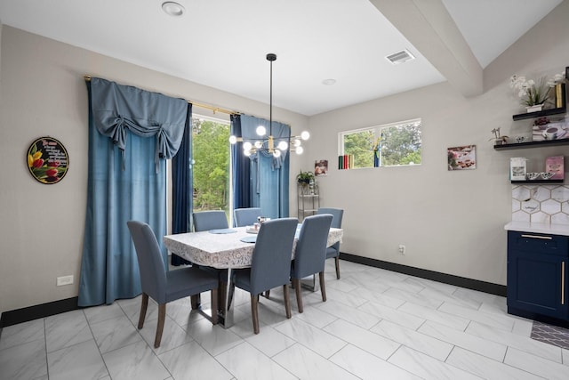16709 W Rayburn Dr, Conroe, TX 77302 - dining room featuring a chandelier, plenty of natural light, and baseboards