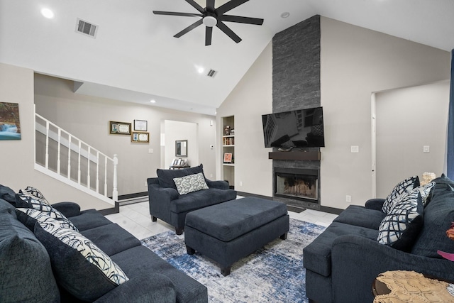 16709 W Rayburn Dr, Conroe, TX 77302 - living area featuring high vaulted ceiling, ceiling fan, stairs, recessed lighting, and built in features
