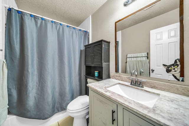 15153 Grassington Dr, Channelview, TX 77530 - full bath featuring a textured ceiling, toilet, vanity, and a textured wall