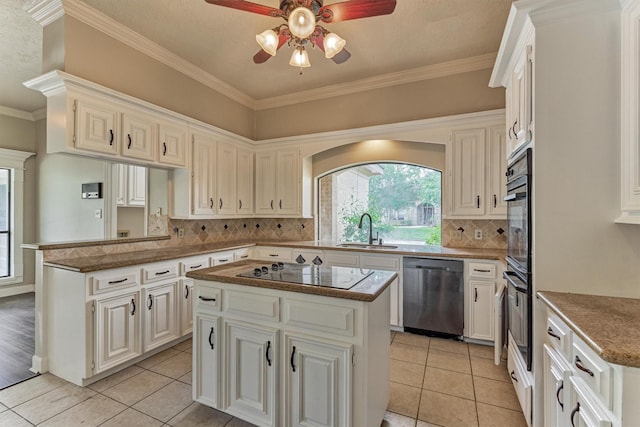 kitchen with dishwasher, a sink, electric stovetop, ceiling fan, and light tile patterned floors