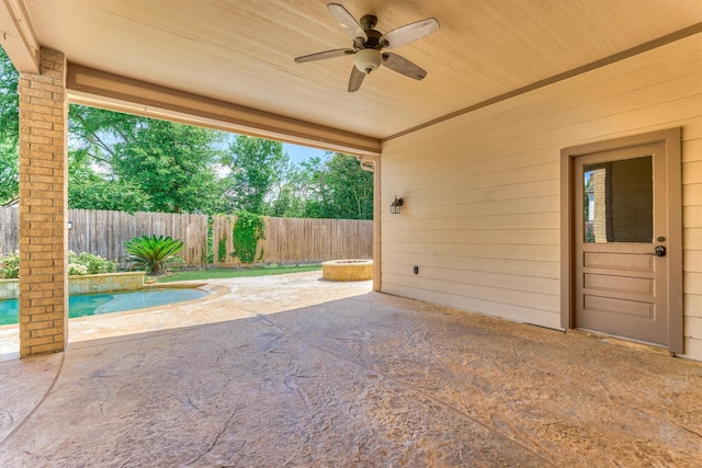 view of patio with ceiling fan and a fenced backyard