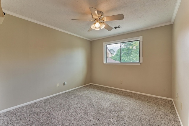 carpeted empty room featuring a textured ceiling, a ceiling fan, baseboards, and crown molding