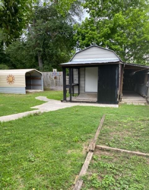 404 Friery St, Dayton, TX 77535 - view of outbuilding featuring an outbuilding