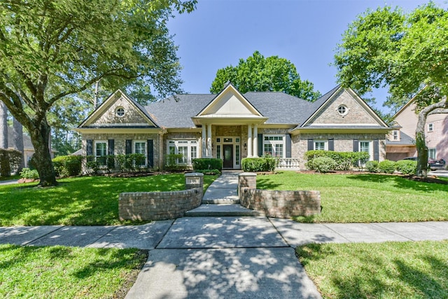 view of front of property with a front lawn