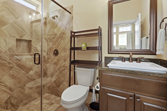 146 Painted Trillium Dr, Conroe, TX 77304 - full bath featuring a stall shower, toilet, and vanity