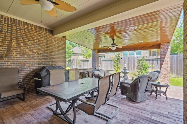 146 Painted Trillium Dr, Conroe, TX 77304 - wooden deck with ceiling fan, outdoor dining area, and fence