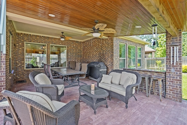 146 Painted Trillium Dr, Conroe, TX 77304 - view of patio with a grill, an outdoor living space, a ceiling fan, and outdoor dining space
