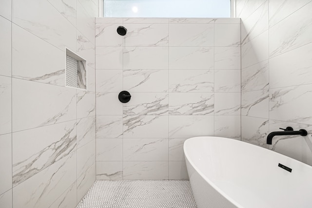 747 Dumble St, Houston, TX 77023 - bathroom featuring a soaking tub and a tile shower