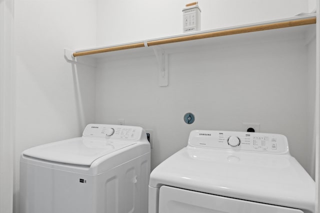 5814 Highland Sky Ln, Houston, TX 77091 - washroom with washer and dryer