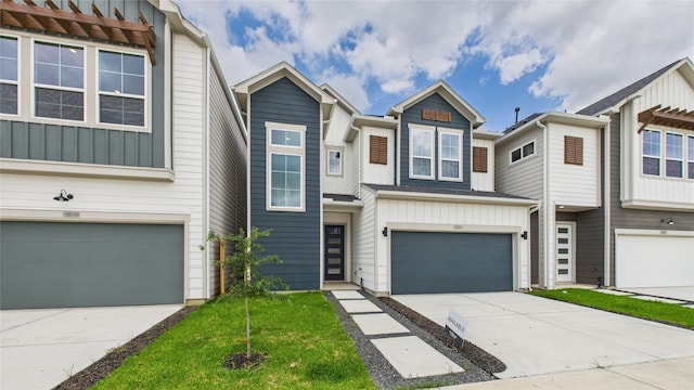5814 Highland Sky Ln, Houston, TX 77091 - multi unit property with a garage, board and batten siding, and driveway
