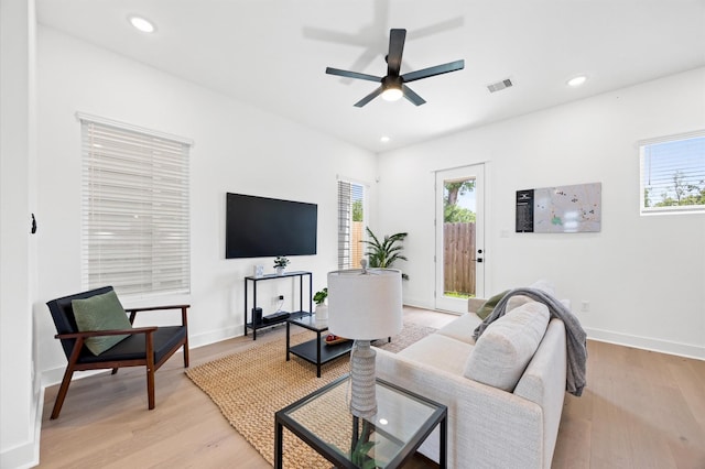 5814 Highland Sky Ln, Houston, TX 77091 - living area featuring light wood-style floors, ceiling fan, and recessed lighting