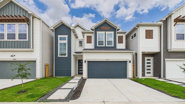 5814 Highland Sky Ln, Houston, TX 77091 - view of property with a garage, board and batten siding, and driveway