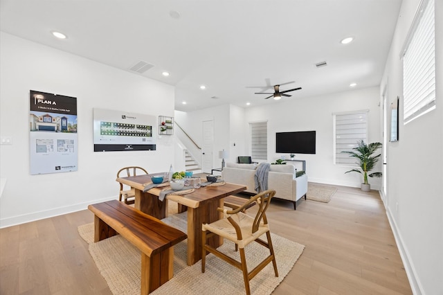 5814 Highland Sky Ln, Houston, TX 77091 - dining space with stairs, recessed lighting, a ceiling fan, and light wood finished floors