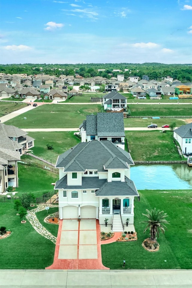 12590 St Ann Ct, Willis, TX 77318 - aerial view of residential area featuring a large body of water