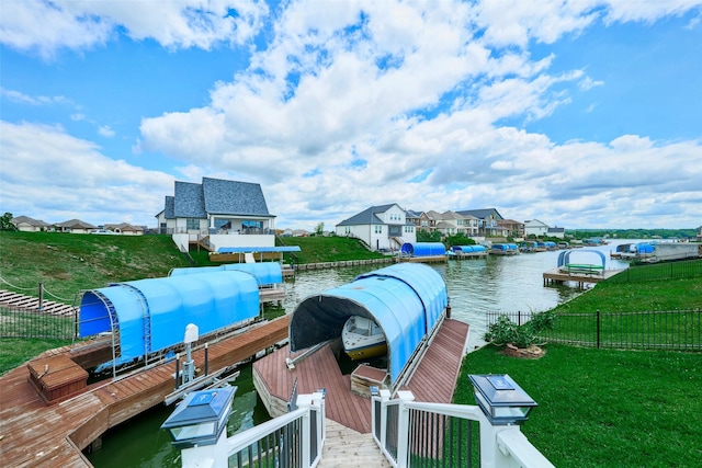 12590 St Ann Ct, Willis, TX 77318 - dock with a water view and a residential view