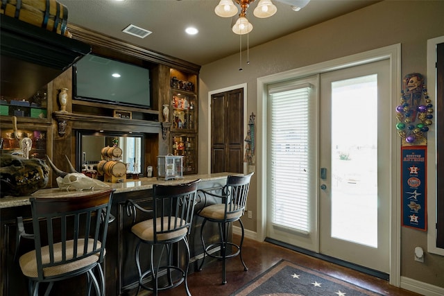 12590 St Ann Ct, Willis, TX 77318 - indoor bar with baseboards