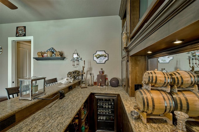 12590 St Ann Ct, Willis, TX 77318 - living room featuring ceiling fan and bar