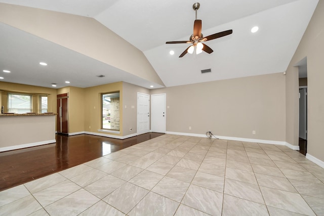 2026 Hickory Glen Dr, Missouri City, TX 77489 - unfurnished living room with lofted ceiling, healthy amount of natural light, a ceiling fan, recessed lighting, and wood finished floors