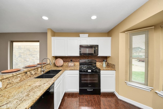 2026 Hickory Glen Dr, Missouri City, TX 77489 - kitchen with black appliances, a sink, dark wood-style floors, white cabinets, and recessed lighting