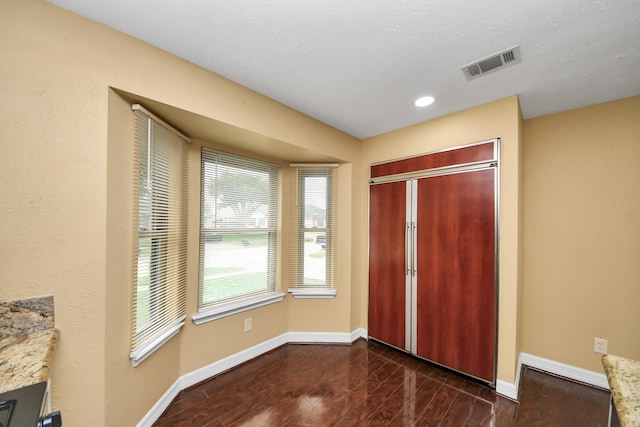 2026 Hickory Glen Dr, Missouri City, TX 77489 - entryway featuring baseboards, dark wood-type flooring, and recessed lighting