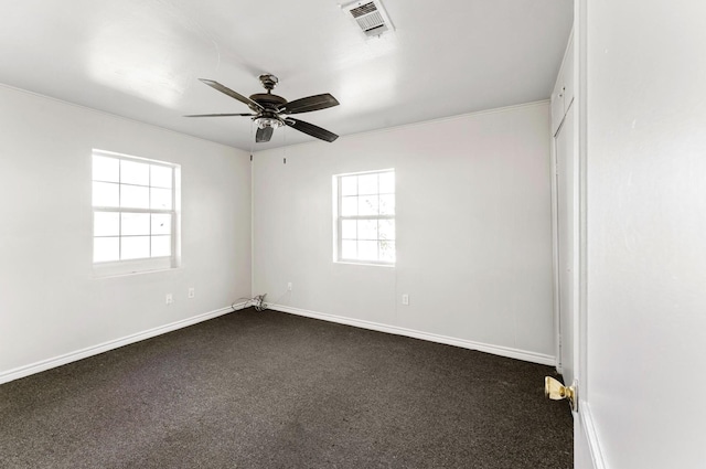 4637 Carmen St, Houston, TX 77051 - spare room featuring plenty of natural light, a ceiling fan, and dark carpet