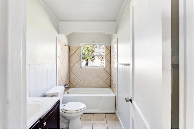 4637 Carmen St, Houston, TX 77051 - full bath with tile patterned floors, toilet, vanity, tile walls, and crown molding