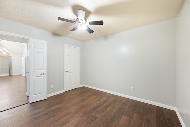 7624 Lone Meadow Ct, Houston, TX 77095 - unfurnished bedroom featuring dark wood-style floors, baseboards, and ceiling fan