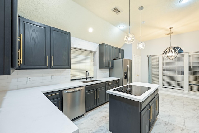 7624 Lone Meadow Ct, Houston, TX 77095 - kitchen with appliances with stainless steel finishes, light marble finish floors, a sink, light countertops, and tasteful backsplash