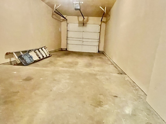2711 Grants Lake Blvd Unit 203, Sugar Land, TX 77479 - garage with a garage door opener