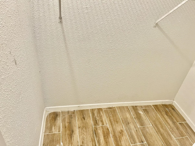 2711 Grants Lake Blvd Unit 203, Sugar Land, TX 77479 - spacious closet with wood finished floors